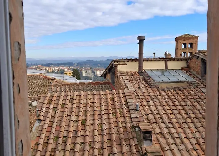 Dimora Con Finestra Sui Tetti Di Lägenhet