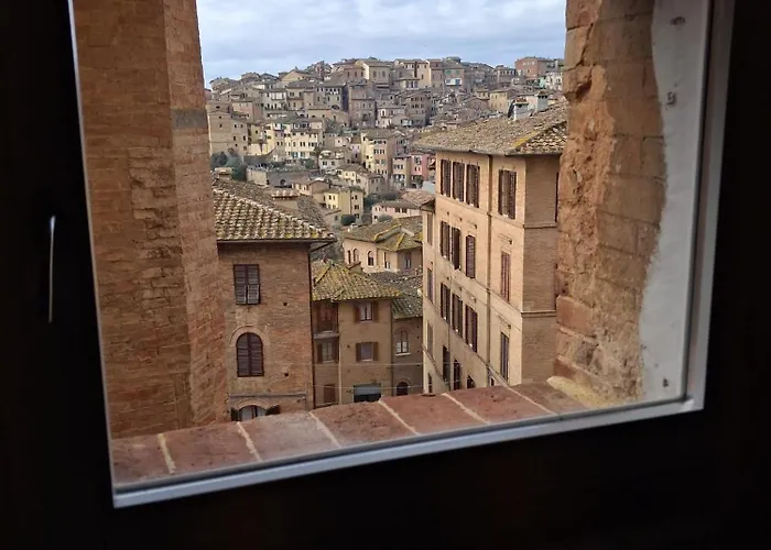 Dimora Con Finestra Sui Tetti Di *